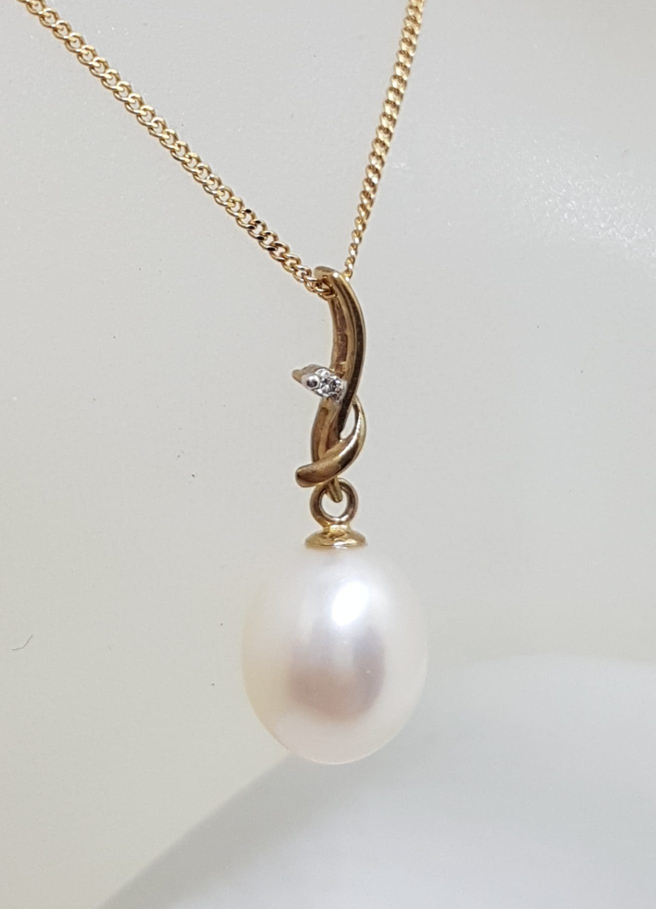 9ct Yellow Gold Pearl Drop on Diamond Twist Pendant on Gold Chain