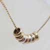 9ct Yellow, Rose and White Gold 7 Lucky Rings Three Tone Pendant on Gold Chain