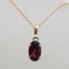 9ct Yellow Gold Oval Claw Set Garnet Pendant on Gold Chain