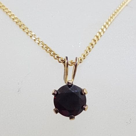 9ct Yellow Gold Round Claw Set Garnet Pendant on Gold Chain