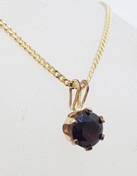 9ct Yellow Gold Round Claw Set Garnet Pendant on Gold Chain