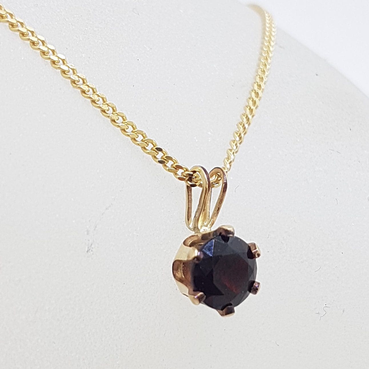 20210111_205039 9ct Yellow Gold Round Claw Set Garnet Pendant on Gold Chain