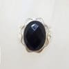 Sterling Silver Oval Onyx with Ornate Rim Ring - Faceted
