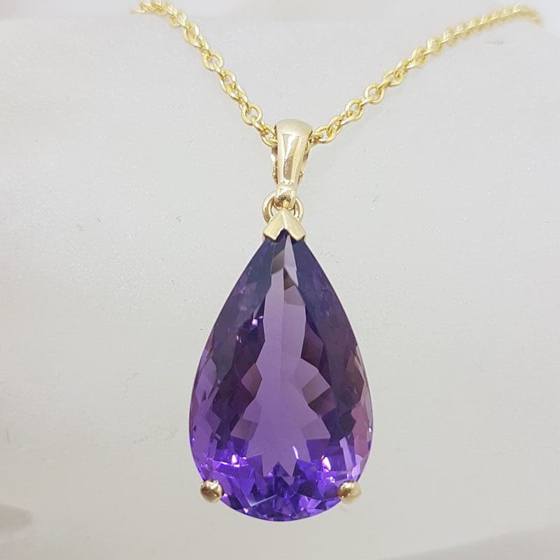 20210112_194500 9ct Yellow Gold Large Teardrop / Pear Shape Claw Set Amethyst Pendant on Gold Chain