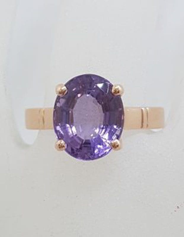 9ct Rose Gold Oval Claw Set Amethyst Ring