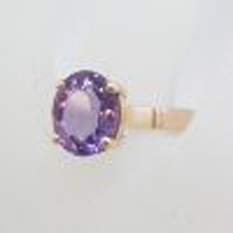 9ct Rose Gold Oval Claw Set Amethyst Ring