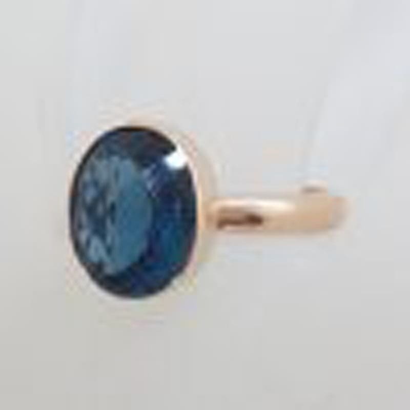 9ct Rose Gold Oval Bezel Set London Blue Topaz Ring