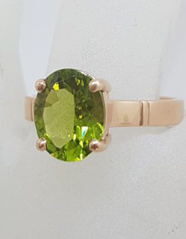 9ct Rose Gold Oval Claw Set Peridot Ring