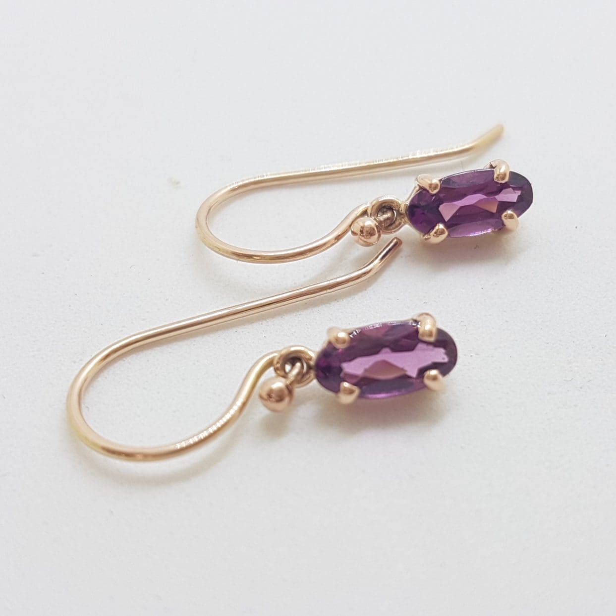 9ct Rose Gold Oval Claw Set Rhodolite Garnet Drop Earrings