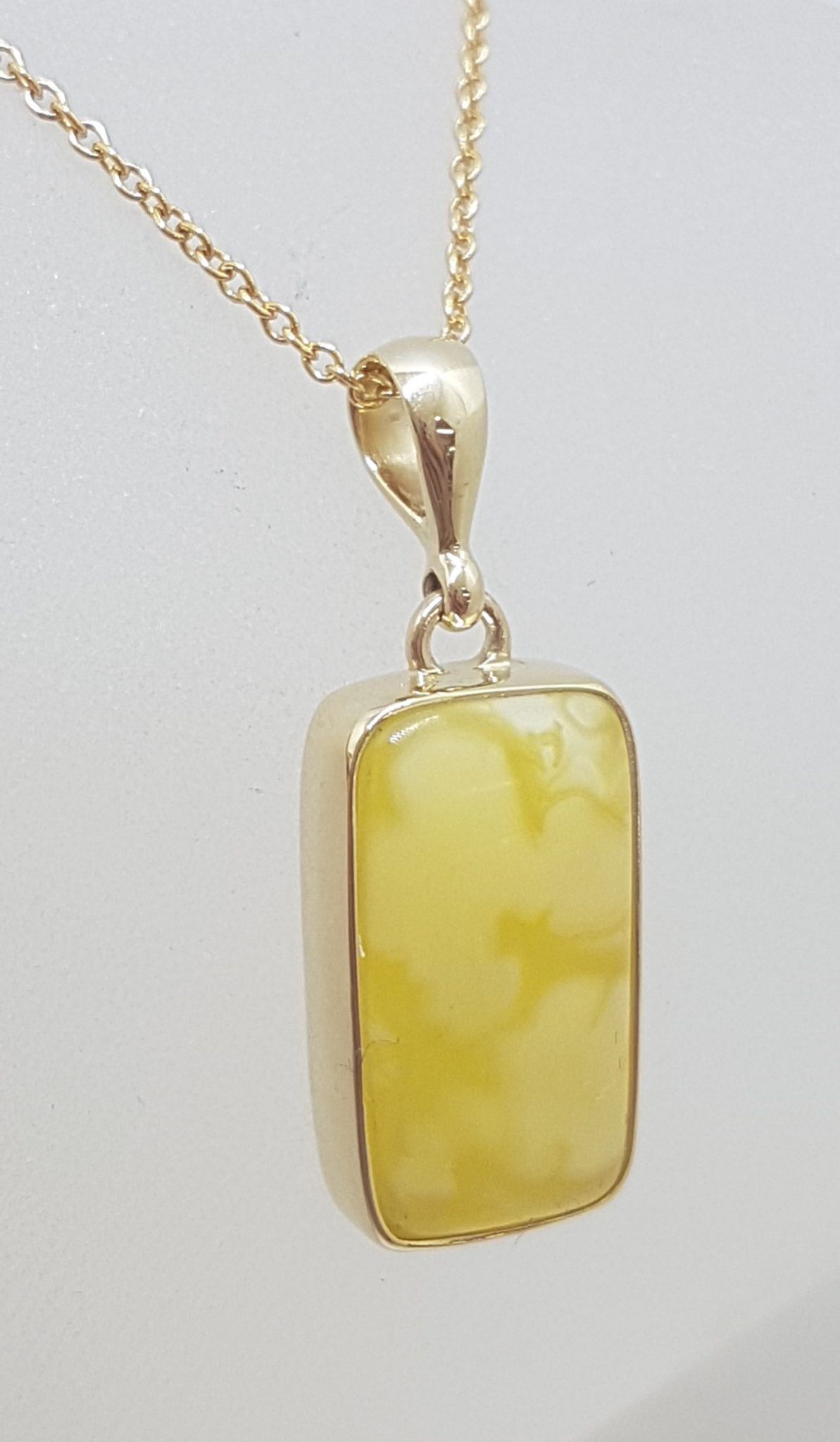 20210115_190455 9ct Yellow Gold Bezel Set Natural Butter Amber Rectangular Pendant on Gold Chain