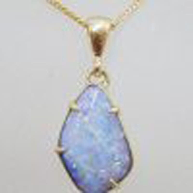 9ct Yellow Gold Odd Shape Blue Opal Claw Set Pendant on Gold Chain