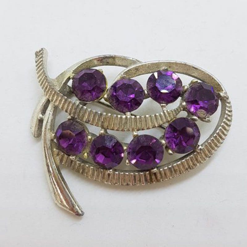 Plated Purple Rhinestone Twist Shape Brooch - Vintage Costume Jewellery
