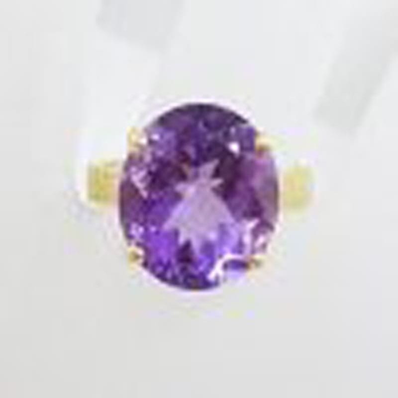 9ct Yellow Gold Large Oval Claw Set Amethyst Ring