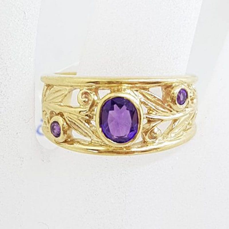 9ct Yellow Gold Filigree Ring featuring Three Amethysts in Ornate Setting - Wide Band