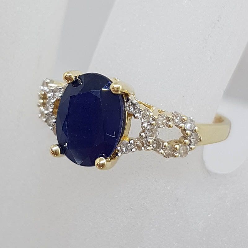 20210524_205922 14ct Yellow Gold Oval Sapphire with Diamond Twist Sides Ring