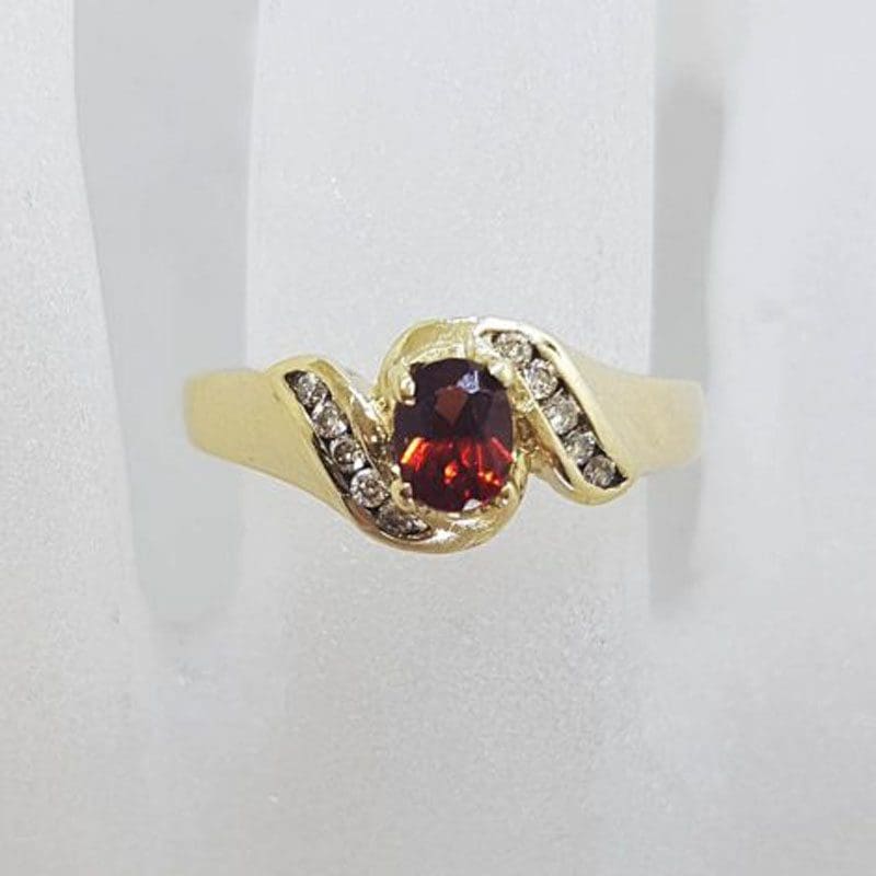 9ct Yellow Gold Oval Claw Set Garnet with Channel Set Diamond Ring