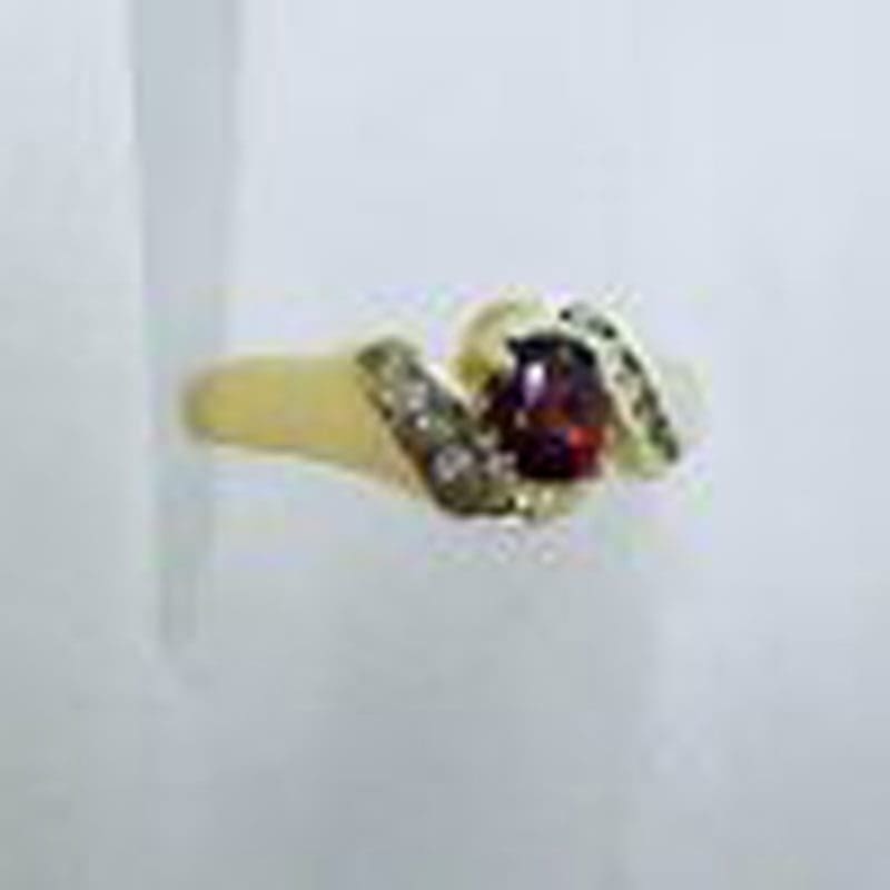 9ct Yellow Gold Oval Claw Set Garnet with Channel Set Diamond Ring