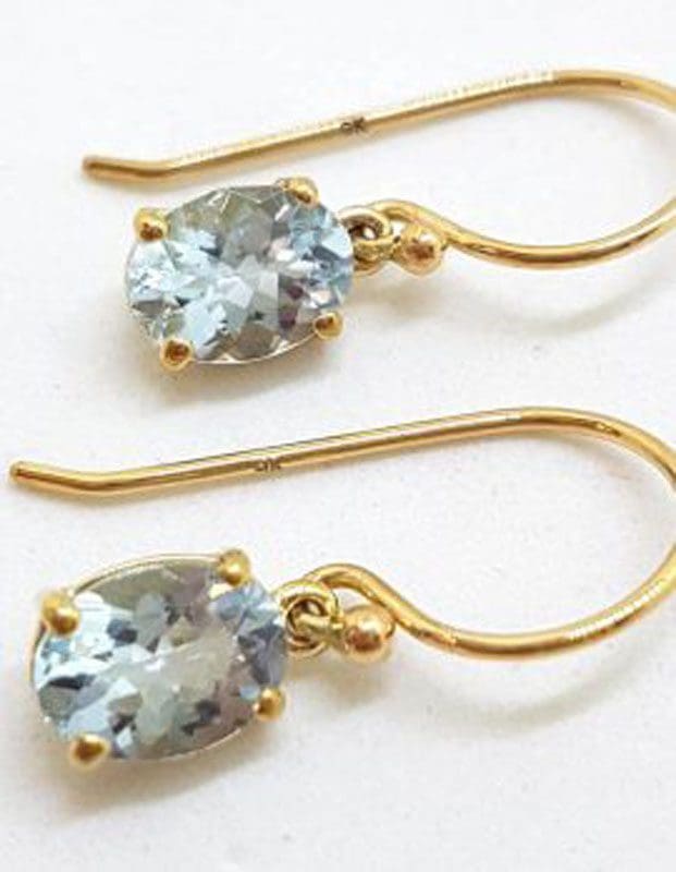9ct Yellow Gold Claw Set Oval Aquamarine Drop Earrings