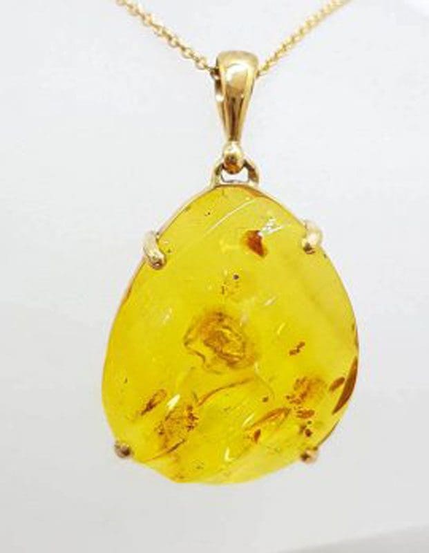 9ct Yellow Gold Large Carved Natural Amber Pendant on 9ct Gold Chain