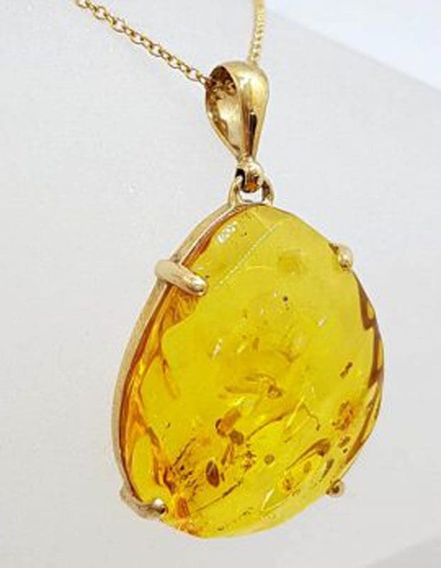 9ct Yellow Gold Large Carved Natural Amber Pendant on 9ct Gold Chain