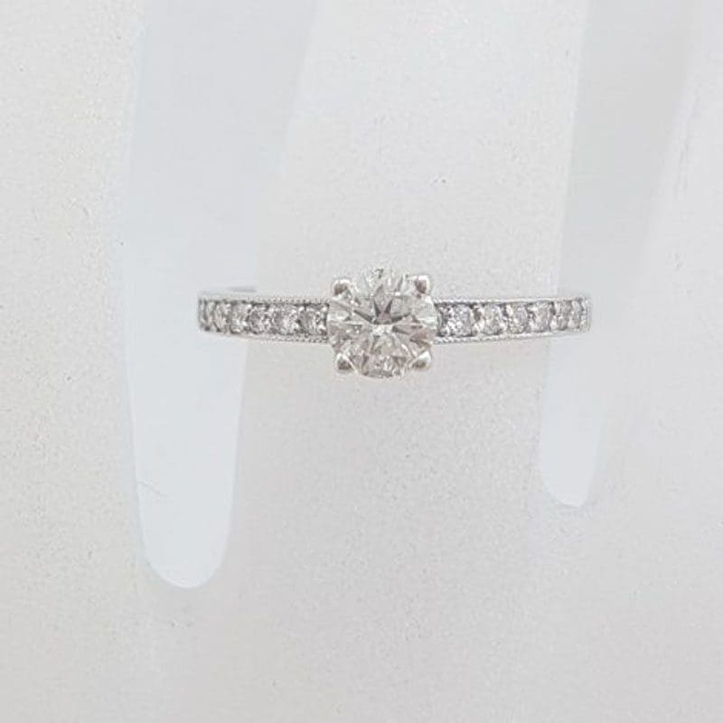 18ct White Gold Diamond Engagement Ring with Claw Set Centre Diamond and Diamonds Along the Shoulder
