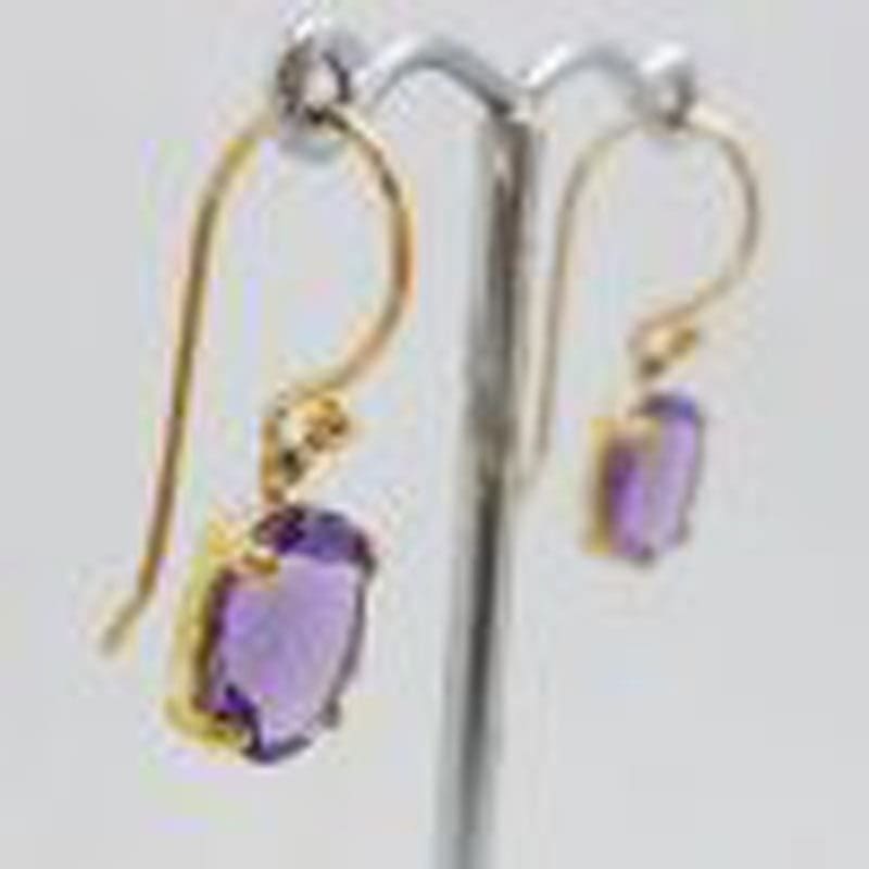 9ct Yellow Gold Oval Claw Set Amethyst Drop Earrings