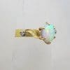 18ct Yellow Gold Solid Oval Opal with Two Diamond Ring