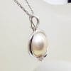14ct White Gold Mabe Pearl with Diamond Enhancer Pendant on Gold Chain