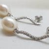 9ct White Gold with Pearl and Diamond Curved Long Drop Earrings