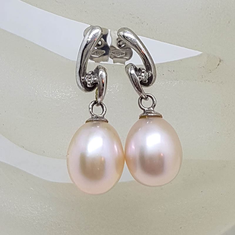 20210618_201101 9ct White Gold Pearl with Diamond Twist Drop Earrings