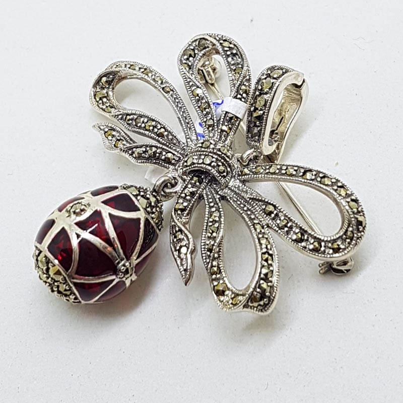 20210714_230153 Sterling Silver Marcasite and Red Enamel Egg Drop on Ornate Bow Enhancer Pendant / Brooch