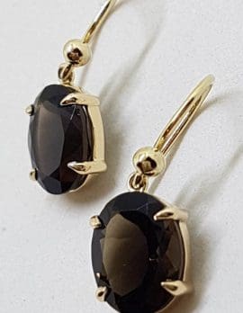 9ct Yellow Gold Oval Claw Set Smokey Quartz Drop Earrings