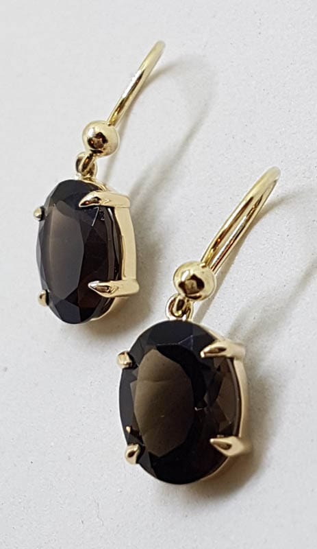 9ct Yellow Gold Oval Claw Set Smokey Quartz Drop Earrings
