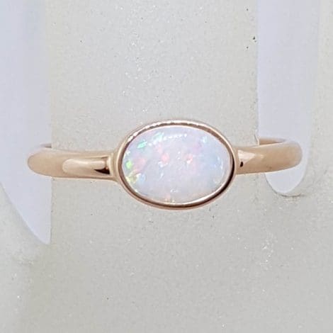 9ct Rose Gold Oval Bezel Set Solid Opal Ring - White with Colour