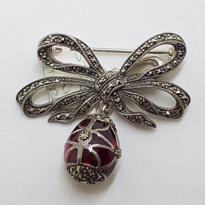 20210720_224750 Sterling Silver Marcasite and Red Enamel Egg Drop on Ornate Bow Enhancer Pendant / Brooch