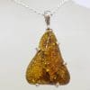 Sterling Silver Freeform Natural Green Baltic Amber Pendant on Silver Chain