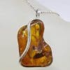 Sterling Silver Large Freeform Natural Baltic Amber with Wave Design Pendant on Silver Chain