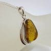 Sterling Silver Freeform Natural Baltic Amber with Wave Design Pendant on Silver Chain