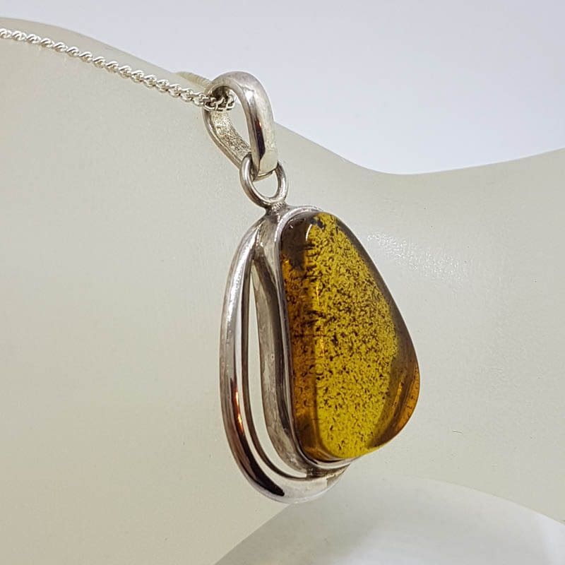 20210724_223734 Sterling Silver Freeform Natural Baltic Amber with Wave Design Pendant on Silver Chain