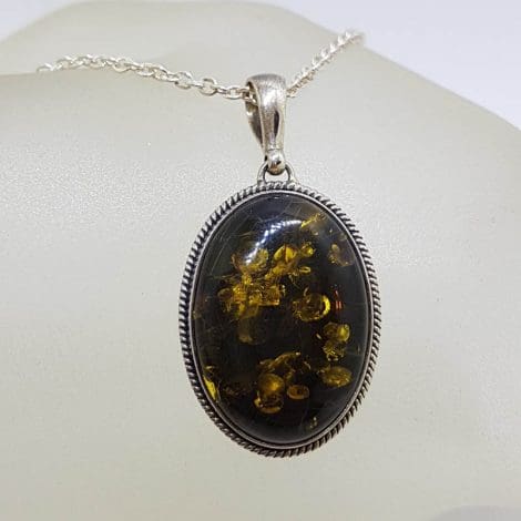 Sterling Silver Oval Natural Green Baltic Amber with Twist Rim Pendant on Silver Chain