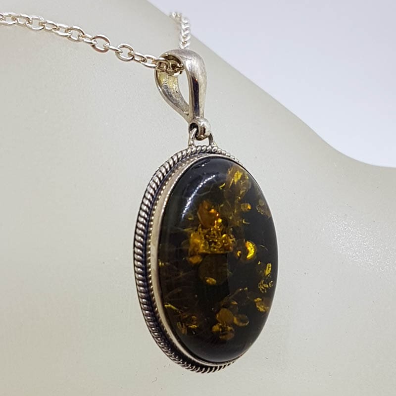 Sterling Silver Oval Natural Green Baltic Amber with Twist Rim Pendant on Silver Chain
