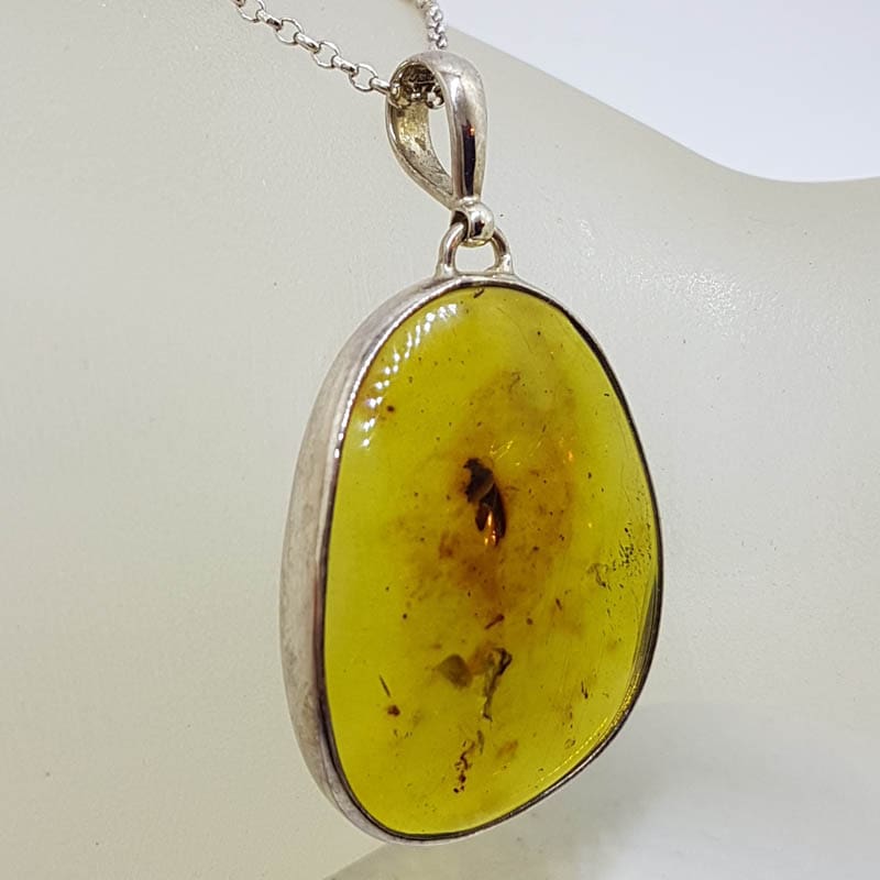 20210724_224653 Sterling Silver Large Oval Natural Green Colombian Amber Pendant on Silver Chain - with Insect Inclusion