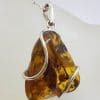 Sterling Silver Large Natural Baltic Amber Freeform Shape with Wave Design Pendant on Silver Chain