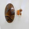 Sterling Silver Large Oval Tiger Eye Ring with Copper Design on Sides