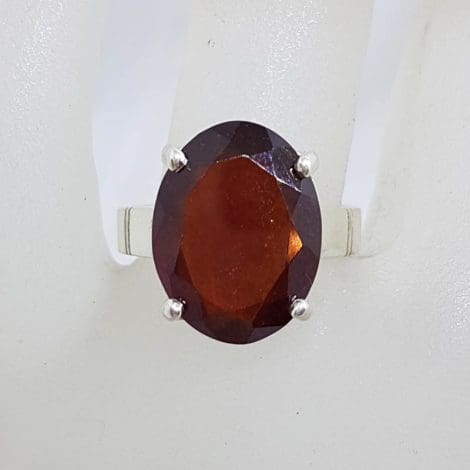 Sterling Silver Large Oval Claw Set Garnet Ring
