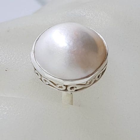 Sterling Silver Round White Mabe Pearl with Ornate Pattern Along Side Ring