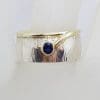 Sterling Silver and Plated Wide Patterned Band Ring with Oval Sapphire