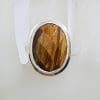Sterling Silver Large Oval Faceted Tiger Eye Ring with Rim