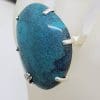 Sterling Silver Very Large Freeform Shape Natural Turquoise Claw Set Ring with Hand on Side