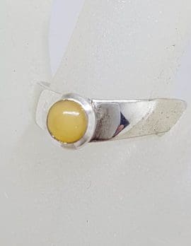 Sterling Silver Round Butter Amber in Curve Ring